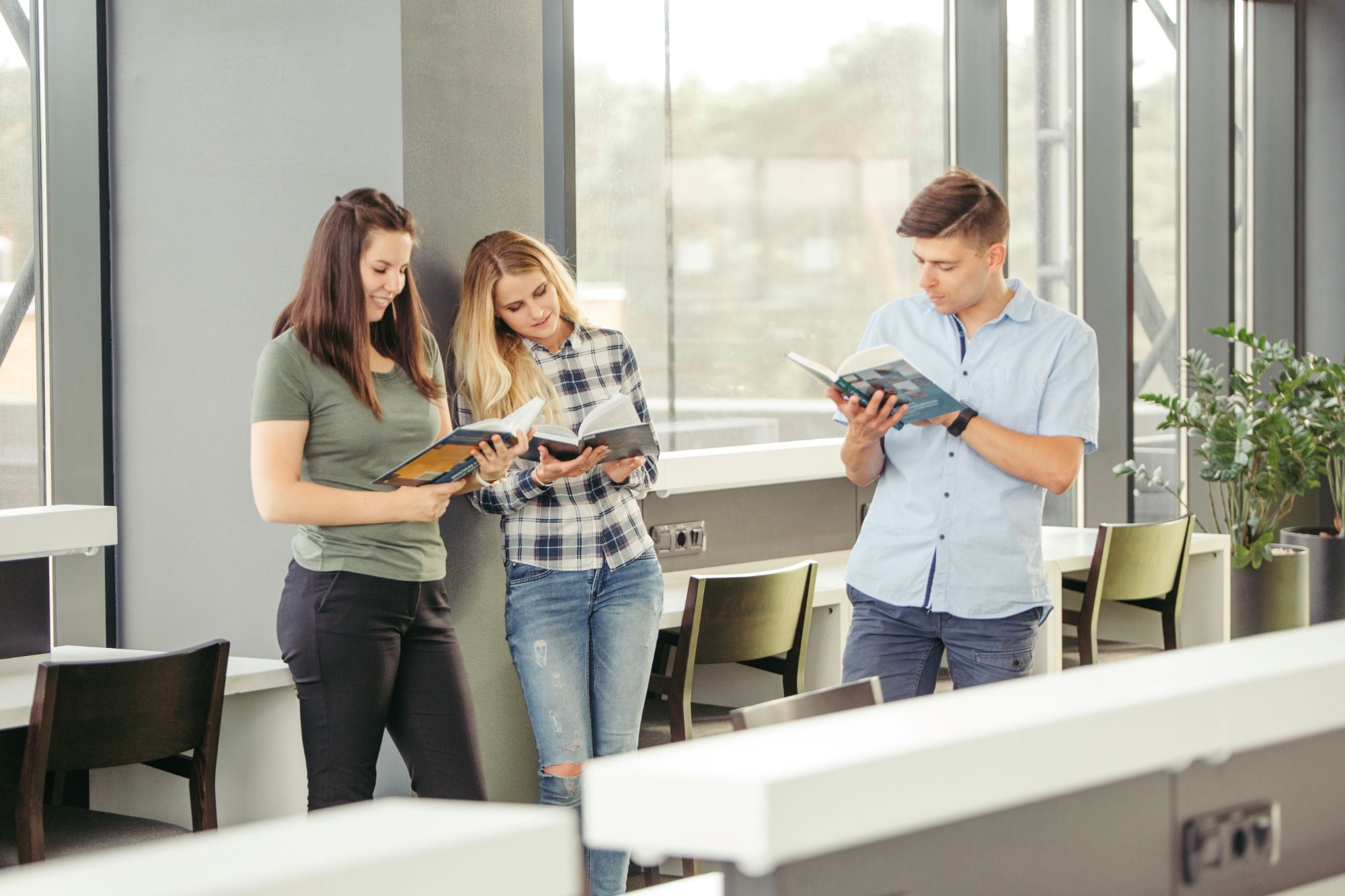 young-readers-standing-library.jpg